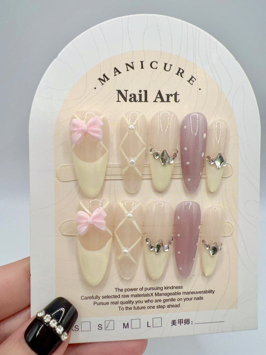 Long Oval Press-On Nails with Rhinestone & Bow Charms – French Tip, Small Size