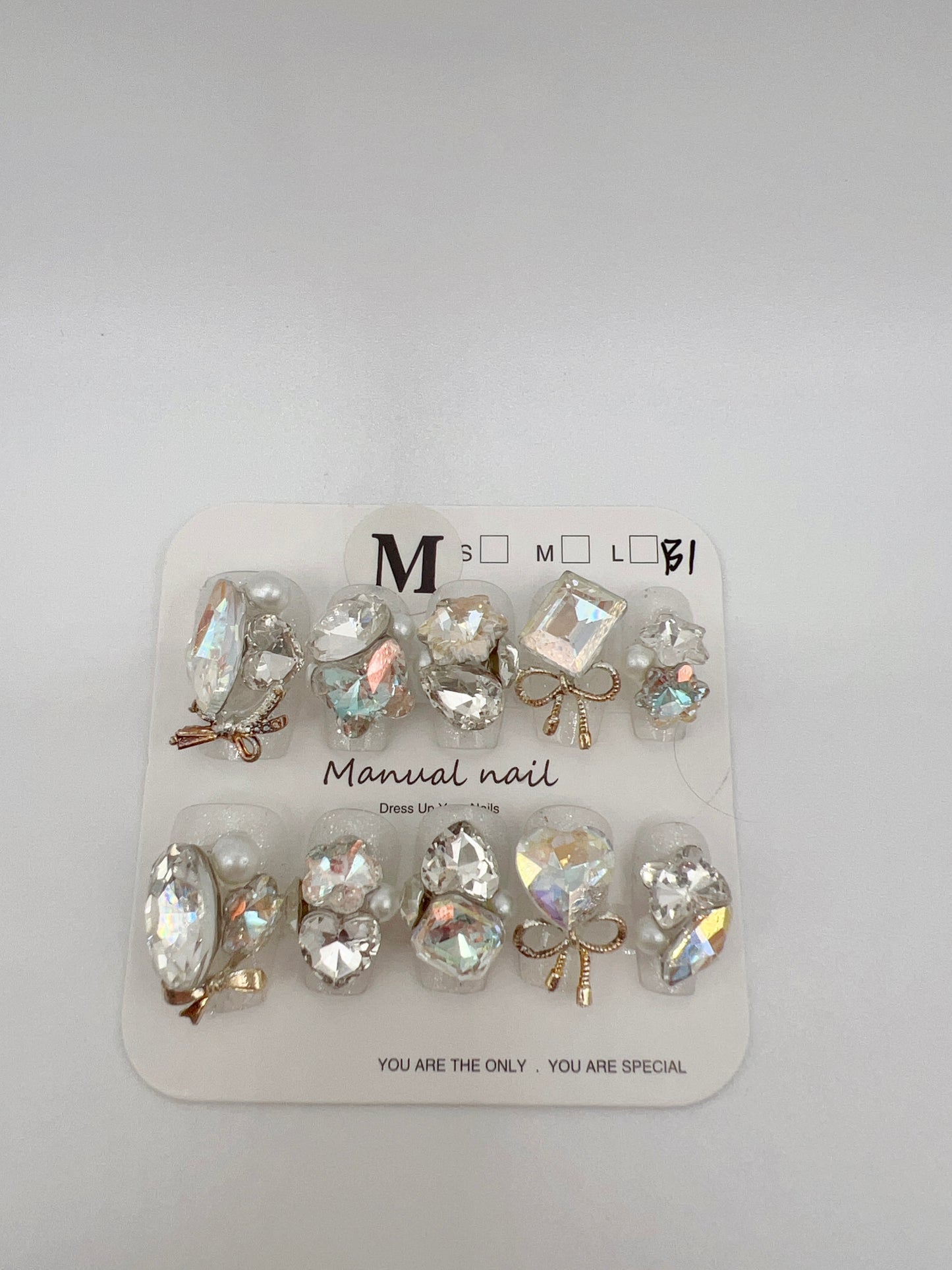 Short Coffin Press-On Nails with Heavy Rhinestones – Medium Size